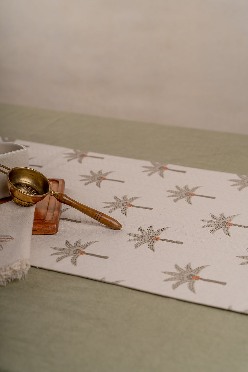 The calm palm table runner in grey